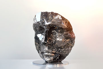Giuseppe D'Angelo una scultura un viso in alabastro e bronzo 