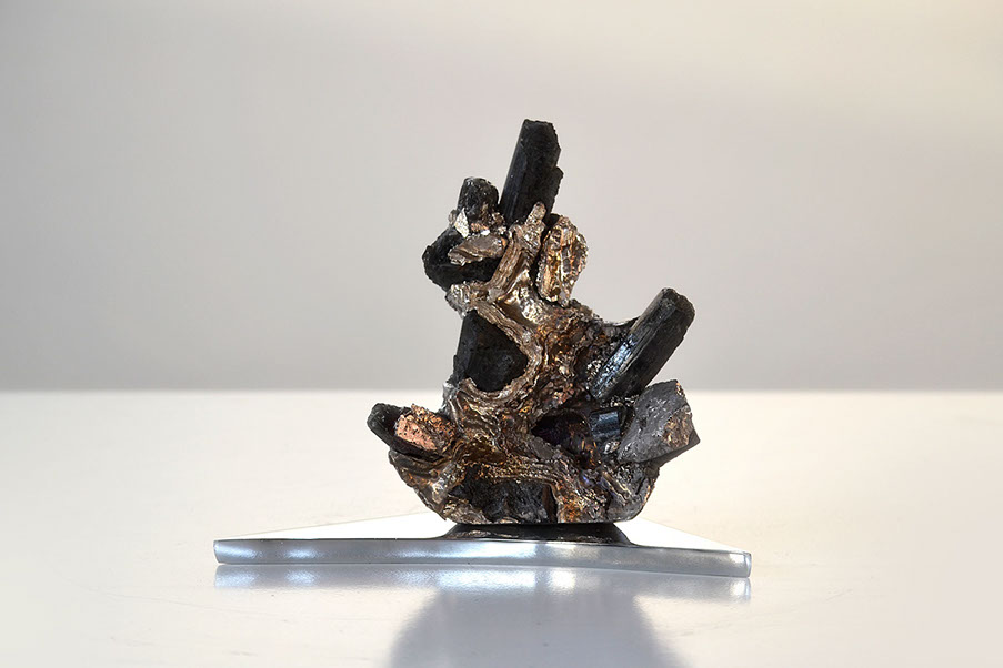Giuseppe D'Angelo scultura un viso in bronzo e marmo emperador