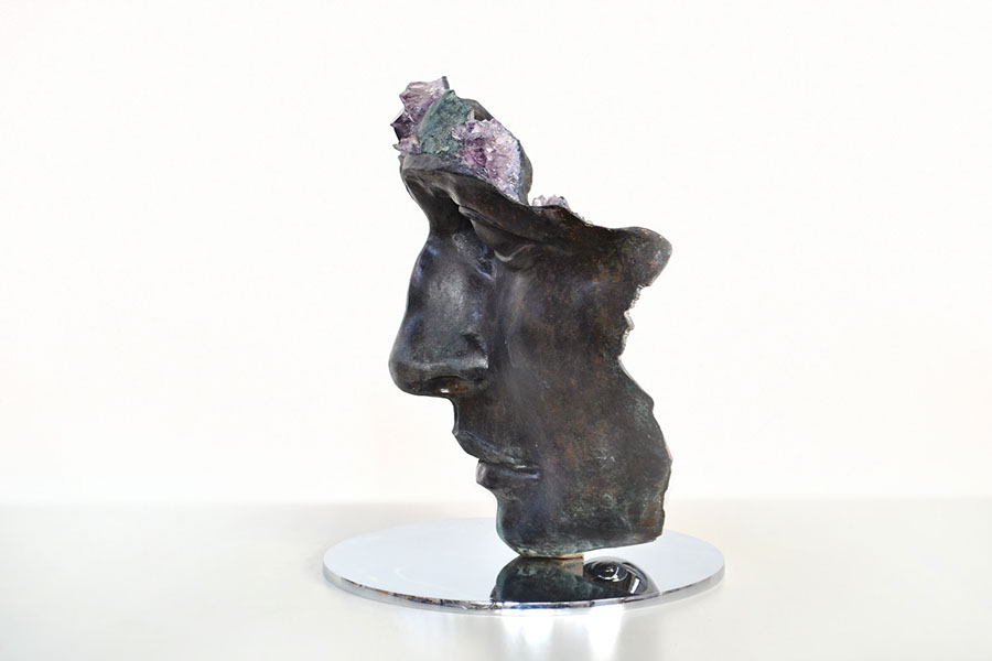 Giuseppe D'Angelo scultura un viso in bronzo e marmo emperador