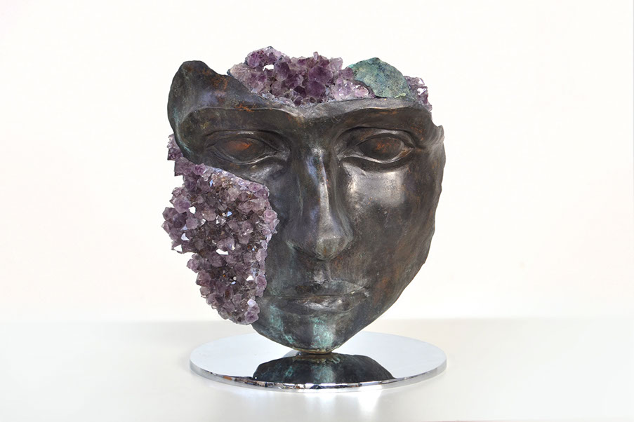 Giuseppe D'Angelo scultura un viso in bronzo e marmo emperador