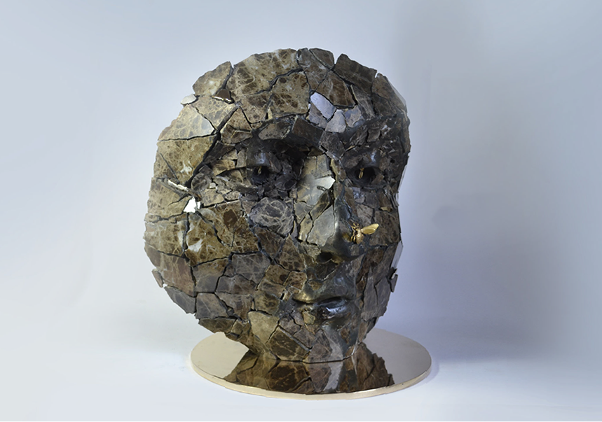 Giuseppe D'Angelo scultore,&nbsp; viso con ape,&nbsp; opera in marmo emperador e bronzo